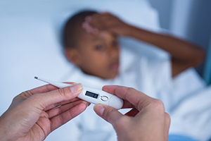 General Physician in Vijayawada treating fever patient